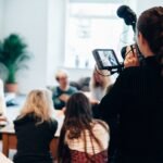 Woman with camera and stabilizer